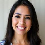 Headshot of satisfied client Elizabeth Gonzales, smiling.